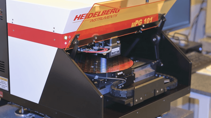 Better Flags | CiClO Flags | Heidelberg Instruments device with a wafer inside on a lab bench.